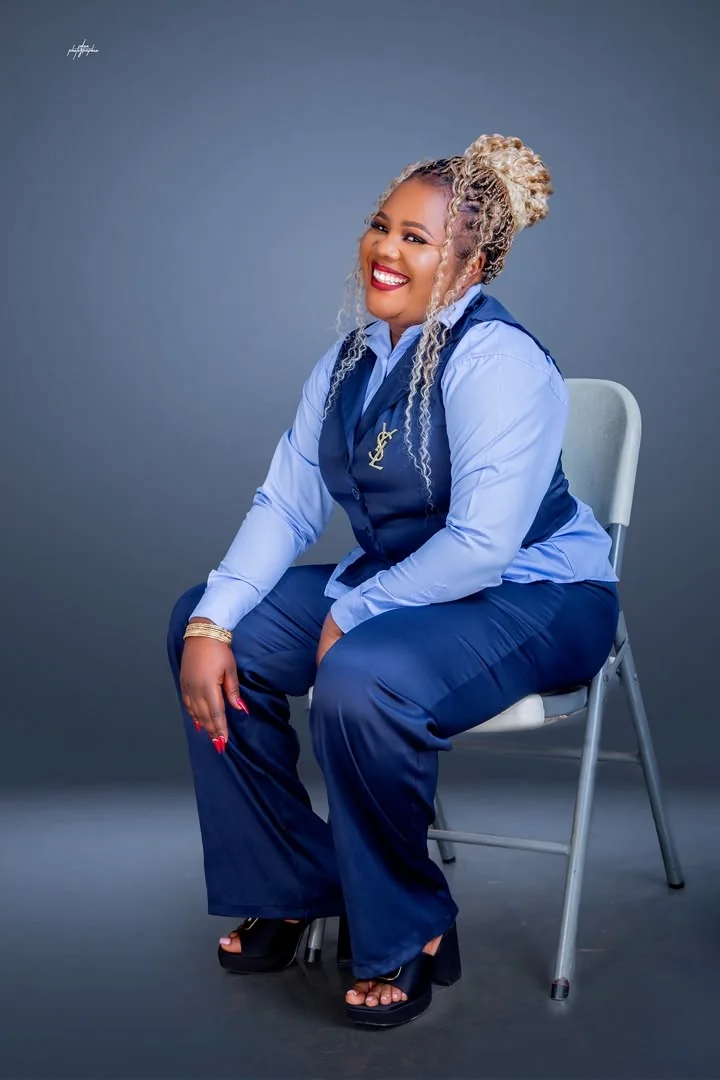 Founder and CEO smiling in professional attire